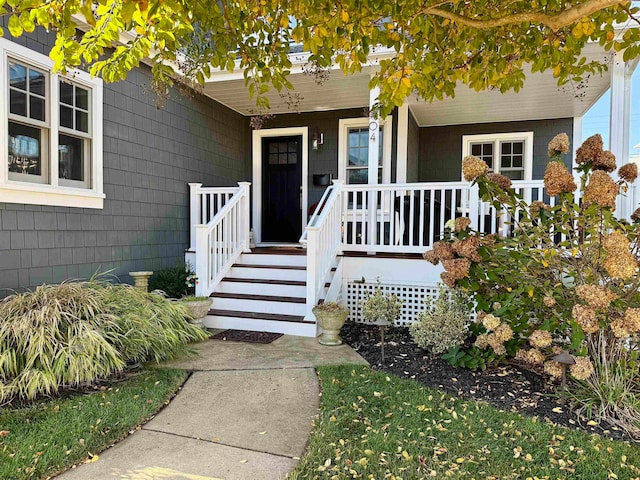 entrance to property with covered porch