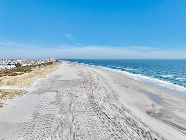 property view of water featuring a view of the beach