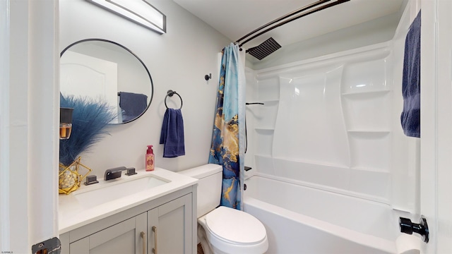 full bathroom with vanity, toilet, and shower / tub combo with curtain