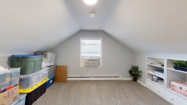 interior space with a baseboard radiator and cooling unit