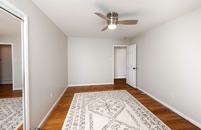 bedroom featuring hardwood / wood-style flooring and ceiling fan