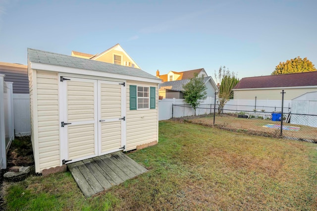 view of outdoor structure featuring a yard