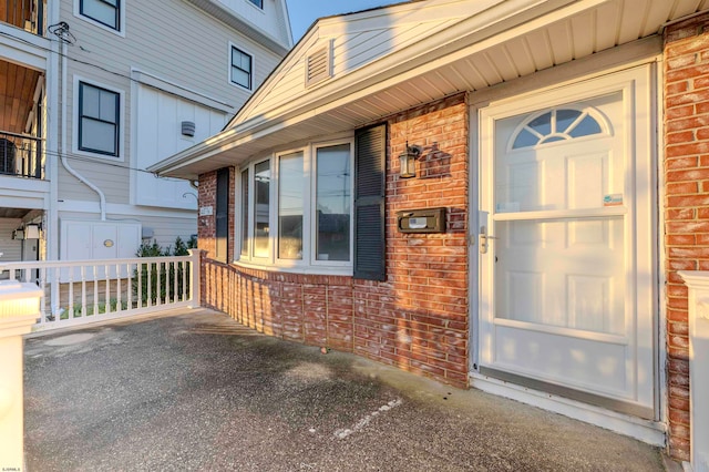 entrance to property with covered porch