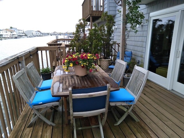 wooden balcony featuring a deck