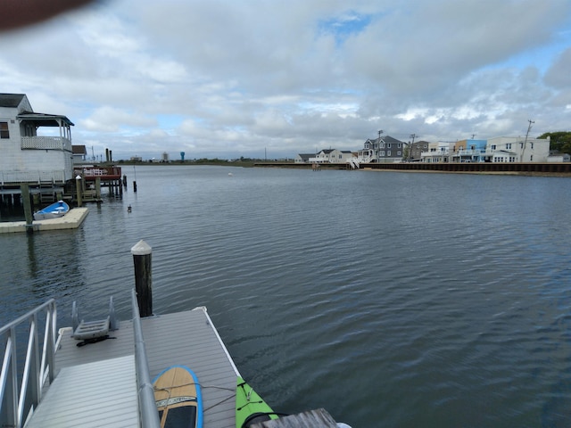 view of dock featuring a water view