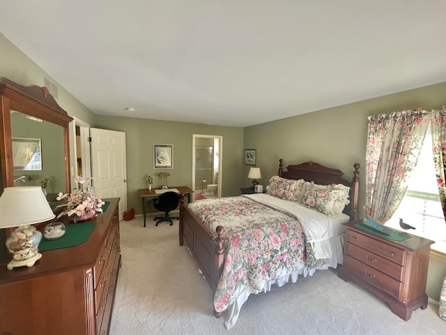 bedroom featuring light carpet