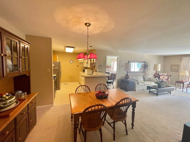 view of carpeted dining space