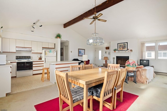 dining area with ceiling fan with notable chandelier, a baseboard heating unit, vaulted ceiling with beams, and light colored carpet