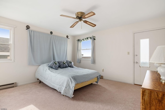 bedroom featuring carpet, multiple windows, and ceiling fan