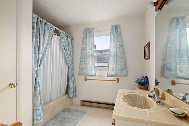 bathroom featuring vanity, shower / bath combo with shower curtain, a textured ceiling, and baseboard heating