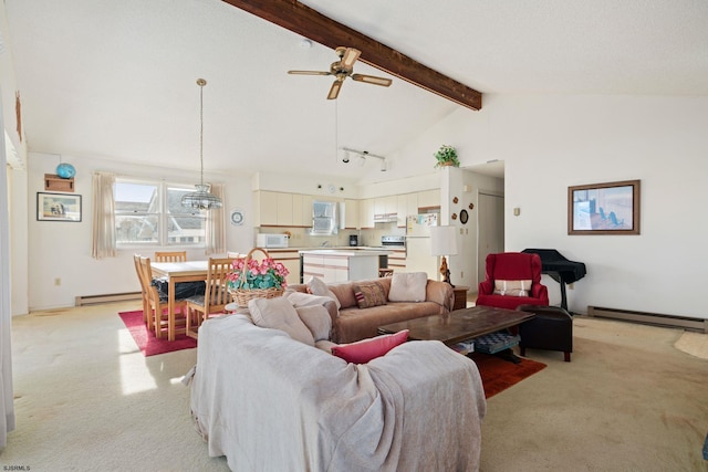 living room featuring light carpet, a baseboard heating unit, lofted ceiling with beams, and ceiling fan