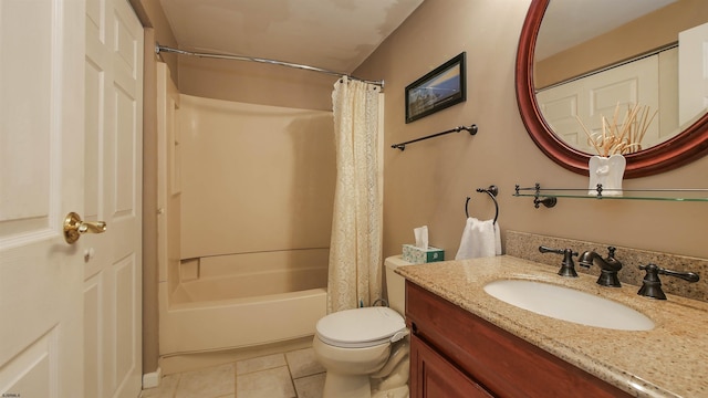 full bathroom with vanity, shower / bath combo with shower curtain, toilet, and tile patterned floors