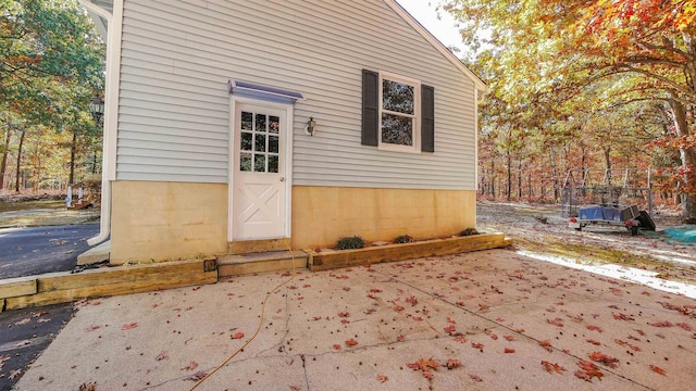 entrance to property with a patio