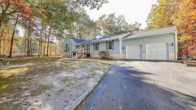 single story home featuring a garage