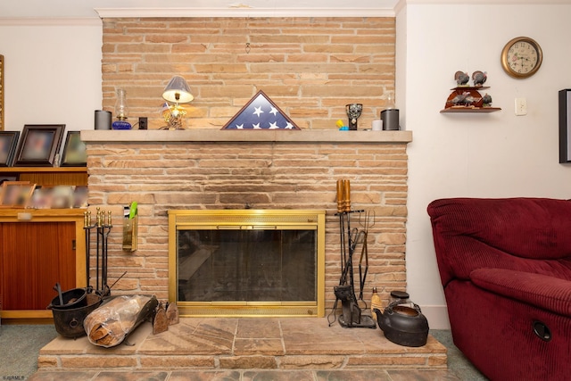 interior space featuring crown molding and a fireplace