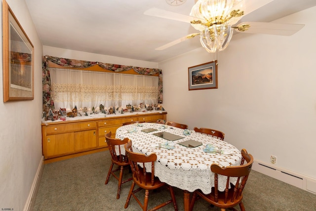 carpeted dining room featuring ceiling fan and baseboard heating