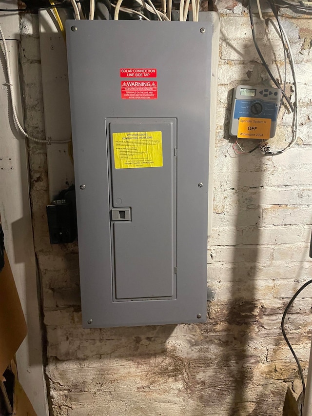 utility room featuring electric panel