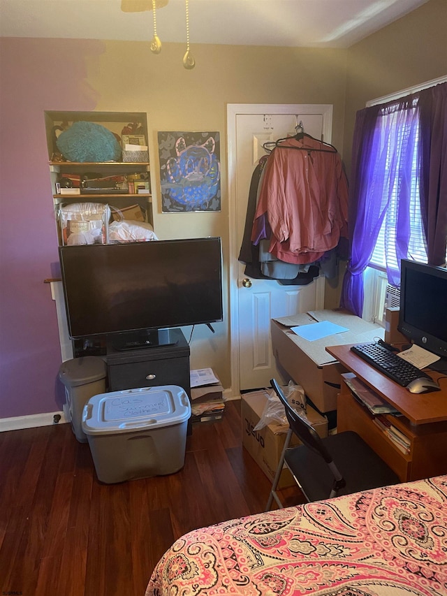 bedroom featuring wood-type flooring