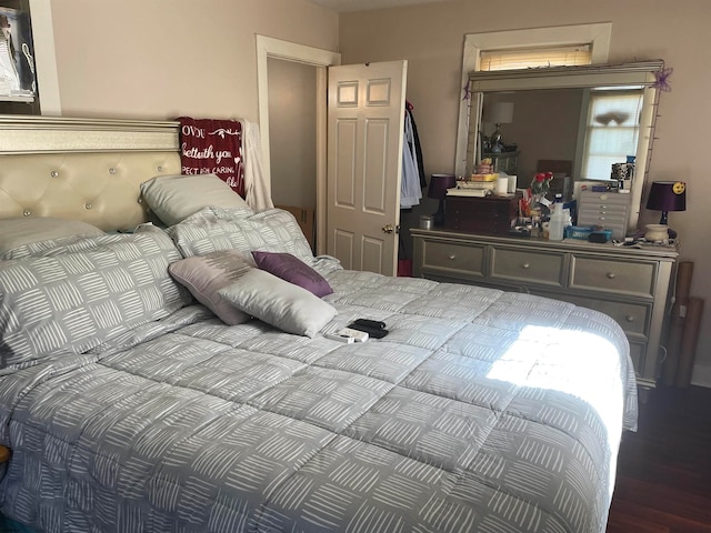 bedroom featuring wood-type flooring