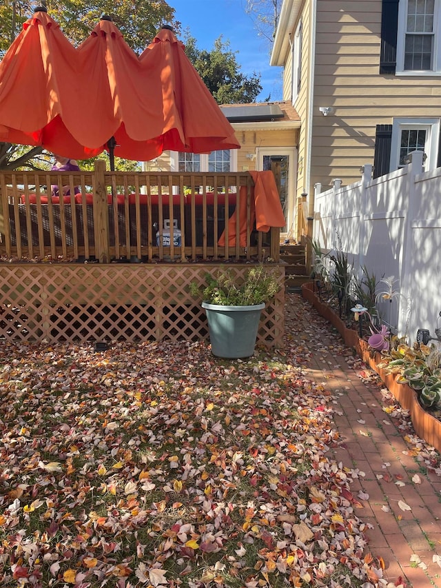 view of yard with a deck