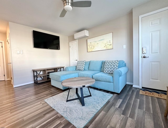 living room featuring an AC wall unit, ceiling fan, and dark hardwood / wood-style floors