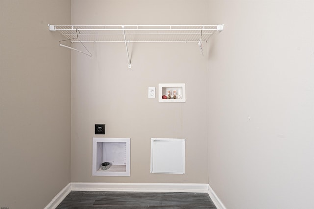 laundry area with dark wood-type flooring, hookup for a washing machine, and hookup for an electric dryer