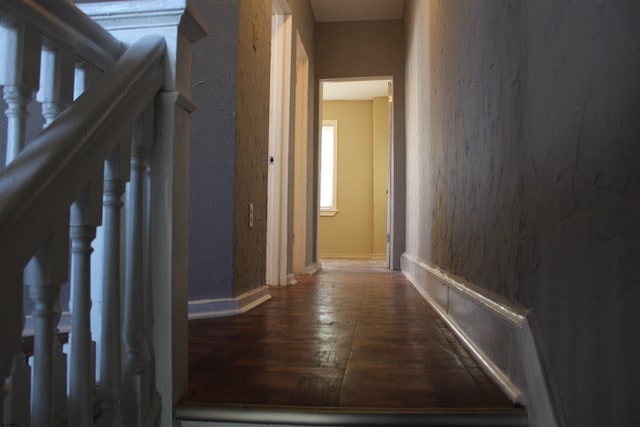 hall with dark hardwood / wood-style floors