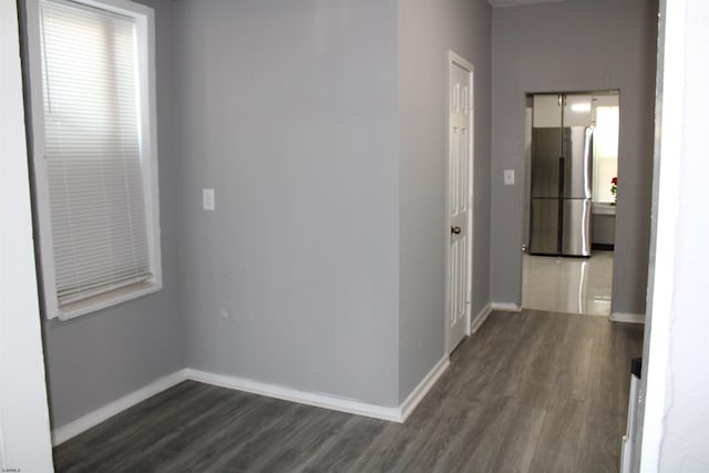 hall featuring dark wood-type flooring