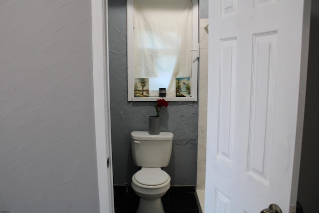 bathroom featuring toilet