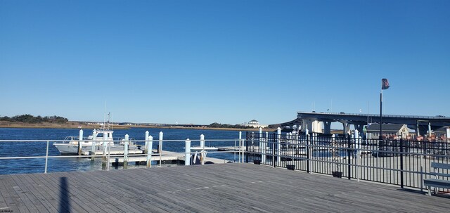 dock area featuring a water view