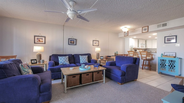 4540 W Brigantine Ave Unit N-102, Brigantine, NJ 08203 - living area featuring ceiling fan, a textured ceiling, and light tile patterned floors