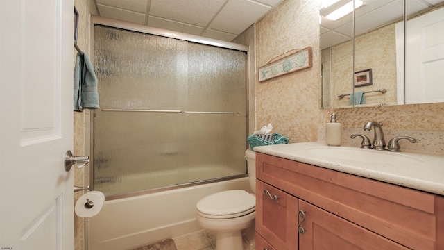 4540 W Brigantine Ave Unit N-102, Brigantine, NJ 08203 - bathroom featuring toilet, a drop ceiling, vanity, enclosed tub / shower combo, and tile patterned flooring