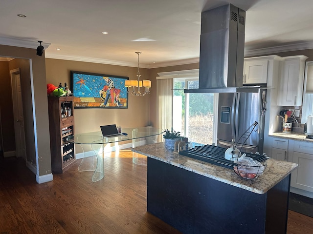 kitchen featuring stainless steel fridge, crown molding, white cabinetry, dark hardwood / wood-style flooring, and pendant lighting