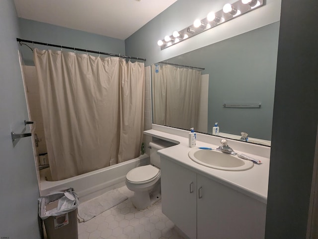 full bathroom with tile patterned flooring, vanity, shower / bath combo, and toilet