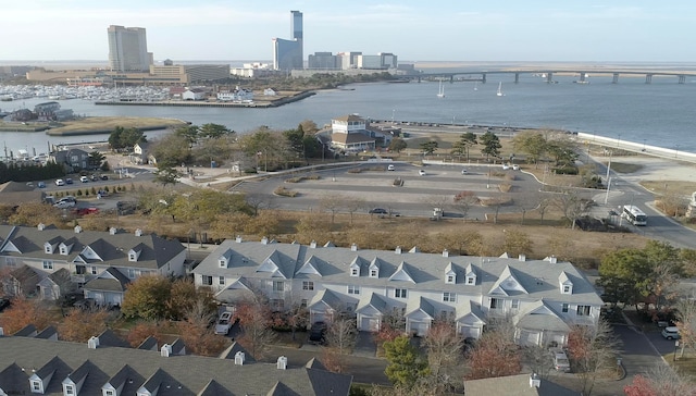 drone / aerial view with a water view