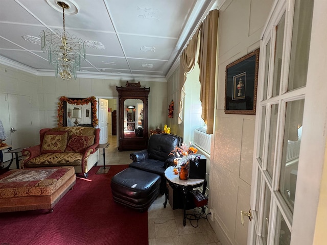 living area with cooling unit and a notable chandelier