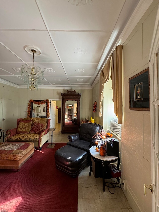 living room with crown molding and a notable chandelier