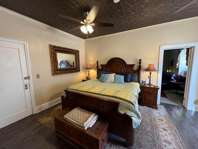 bedroom with dark wood-type flooring and ceiling fan