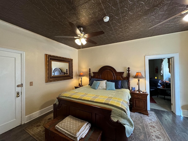 bedroom featuring dark wood-type flooring and ceiling fan