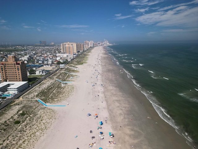 aerial view featuring a beach view and a water view