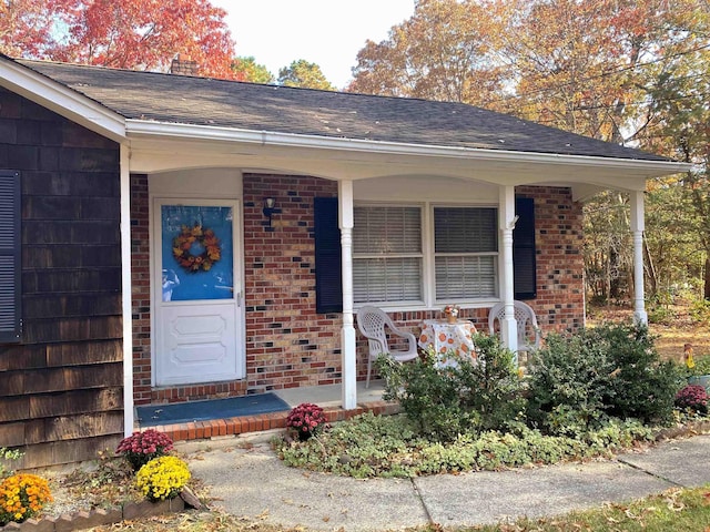 entrance to property with covered porch