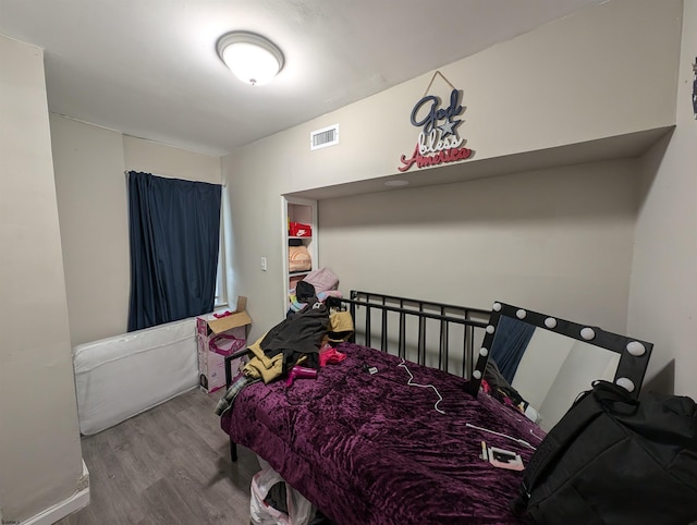 bedroom featuring light wood-type flooring