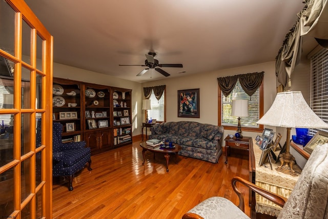 1981 Tuckahoe Rd, Upper Township, NJ 08270 - living room with ceiling fan, healthy amount of natural light, wood finished floors, and baseboards