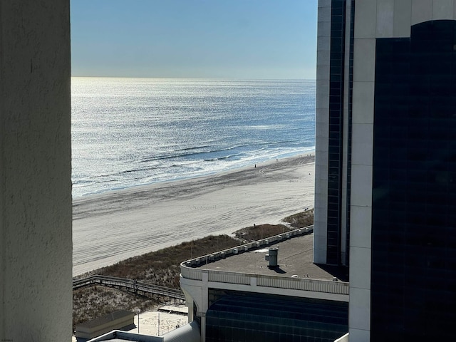 property view of water featuring a beach view