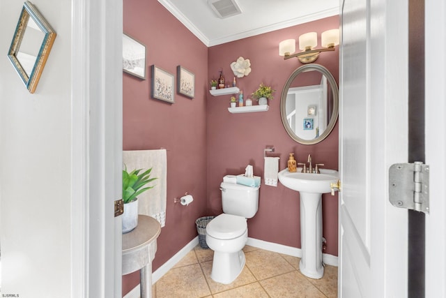 bathroom featuring toilet, sink, tile patterned flooring, and crown molding