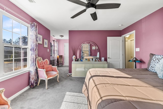 bedroom with ceiling fan and carpet flooring