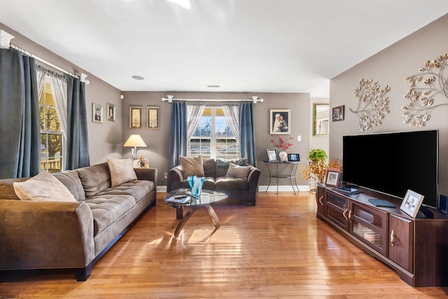 living room featuring light wood-type flooring