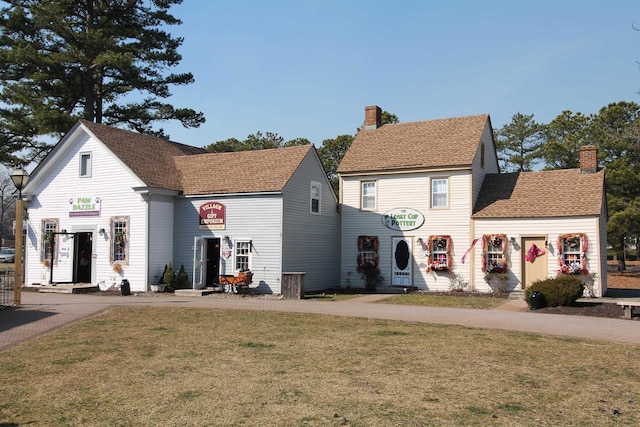 colonial house with a front lawn