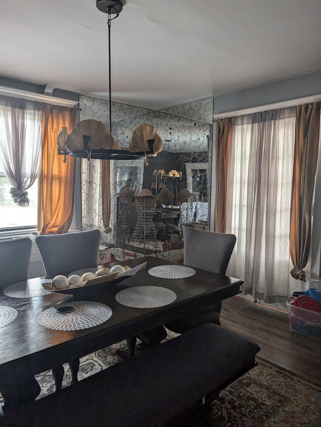 dining space featuring hardwood / wood-style floors