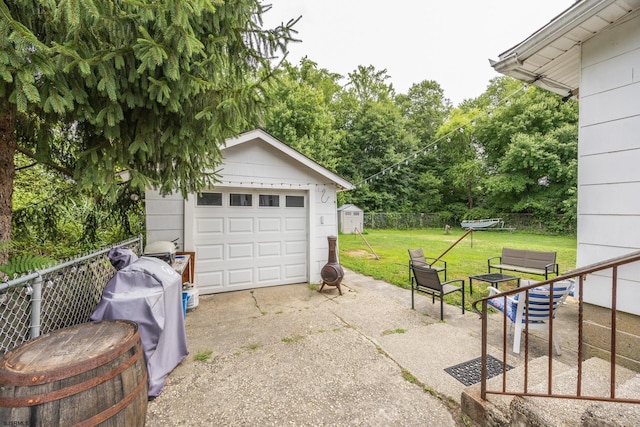 garage with a yard